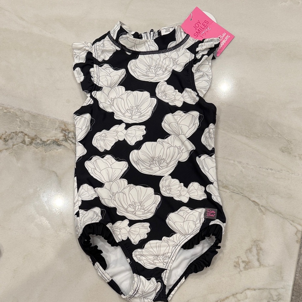 Brand New Ruffle Butts Floral Black and White Swimsuit